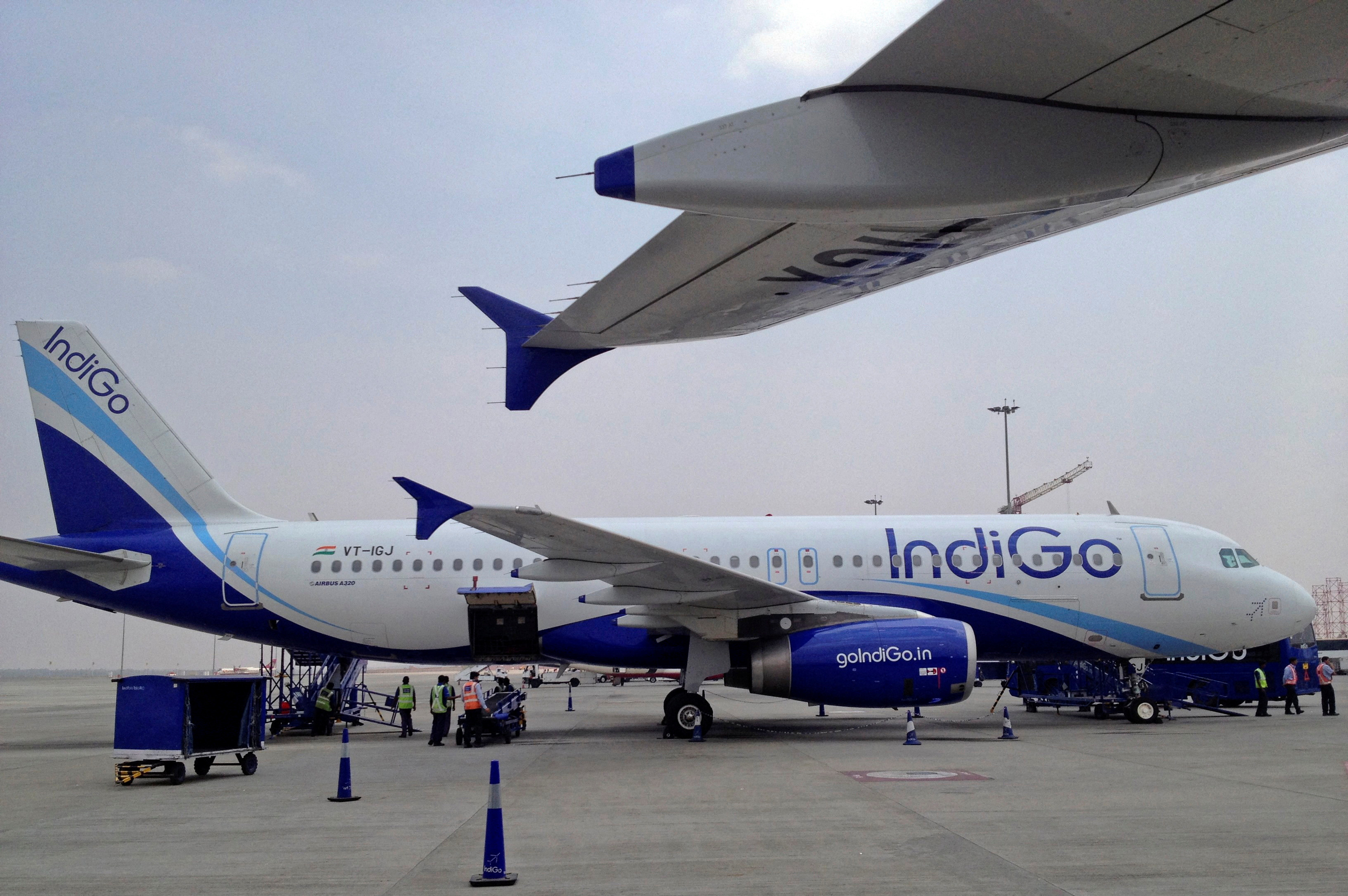 An IndiGo Airlines A320 aircraft is parked on the tarmac at Bengaluru International Airport in Bangalore