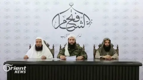 Reuters Screengrab of video showing Abu Mohammed al-Jolani speaking in 2016 under the banner of Jabhat Fatah al-Sham