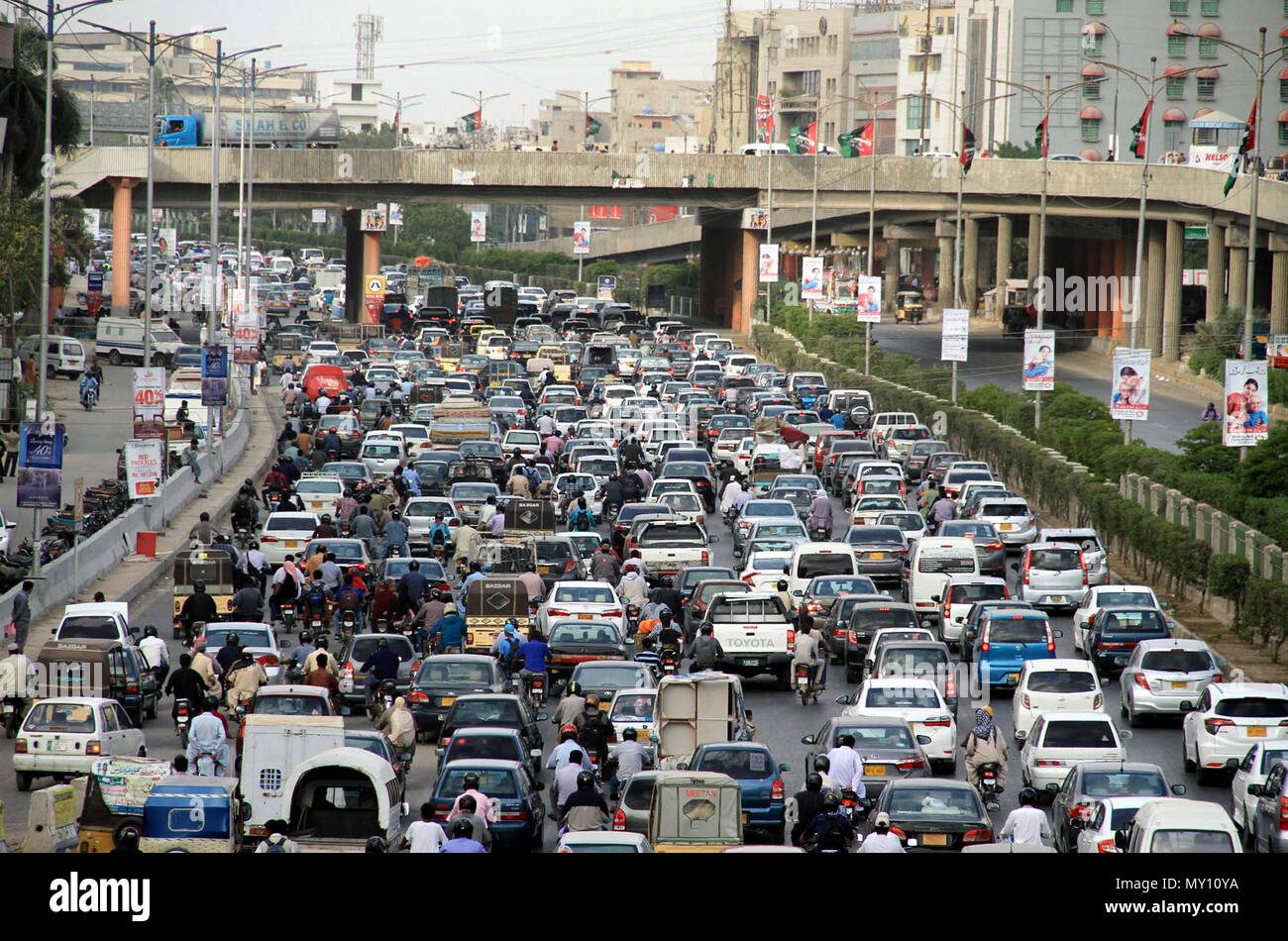 a-large-number-of-vehicles-stuck-in-traffic-jam-before-iftar-during-the-holy-month-of-ramadan-ul-mubarak-at-shahrah-e-faisal-road-in-karachi-on-monday-june-04-2018-MY10YA.jpg