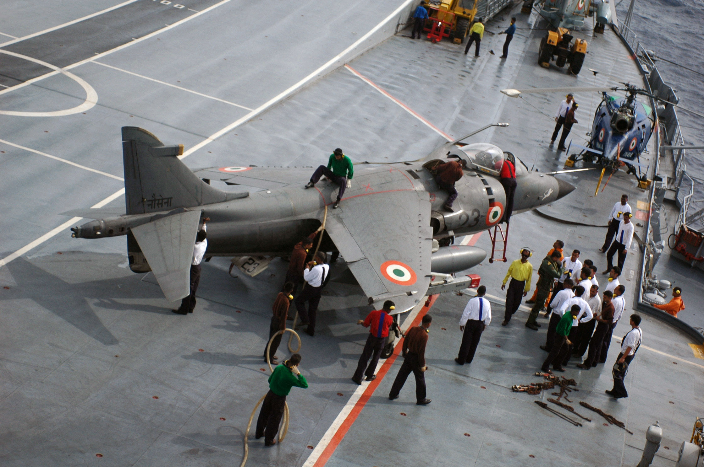 US_Navy_070904-N-5242D-140_Sailors_stationed_aboard_Indian_Navy_aircraft_carrier_INS_Viraat_(R_22)_refuel_a_Sea_Harrier_after_it_returns_from_a_mission_during_Malabar_2007.jpg