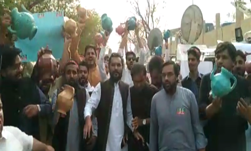 PTI supporters protest outside the Sindh House in Islamabad on Friday. — DawnNewsTV