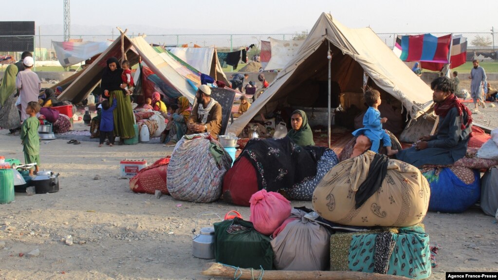FILE - Afghan refugees rest in tents at a makeshift shelter camp in Chaman, a Pakistani town on the border with Afghanistan, Aug. 31, 2021.