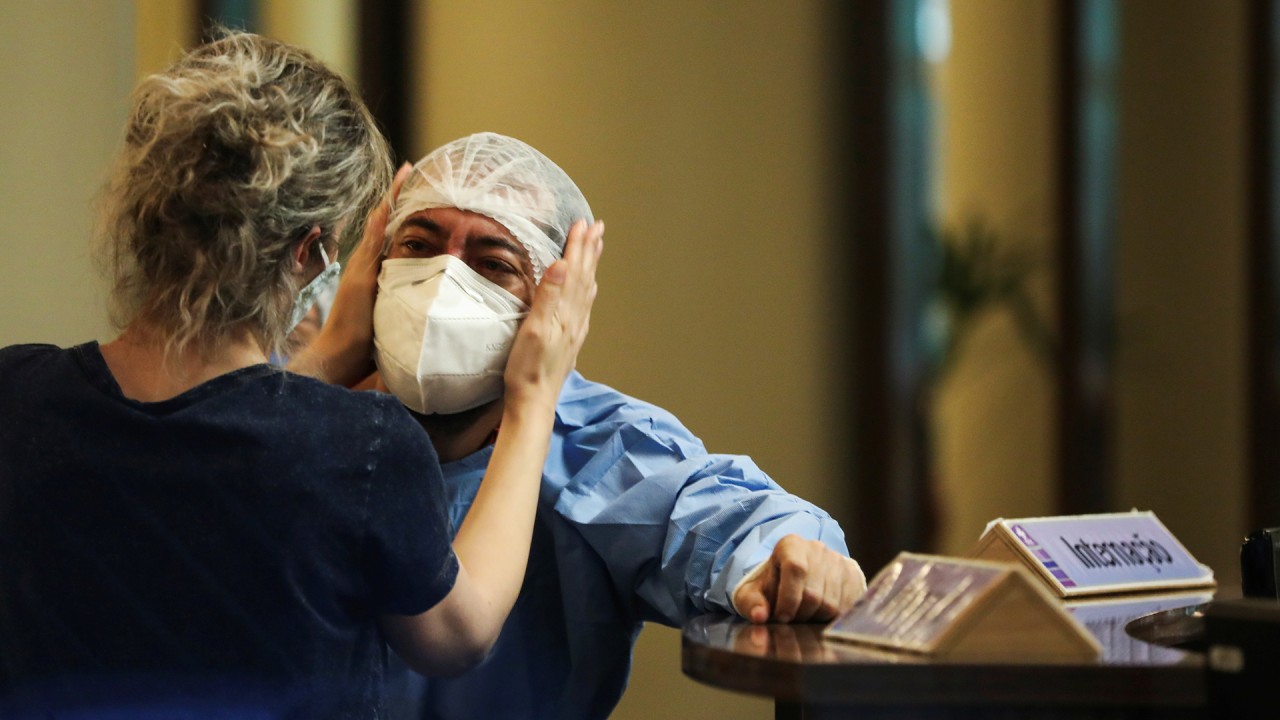 Brazilians queue for oxygen as hospitals face shortages and run out of beds for Covid-19 patients