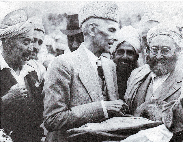 Quaid-e-Azam+accepting+a+loaf+of+bread+from+tribesmen+in+Khyber+Agency.png