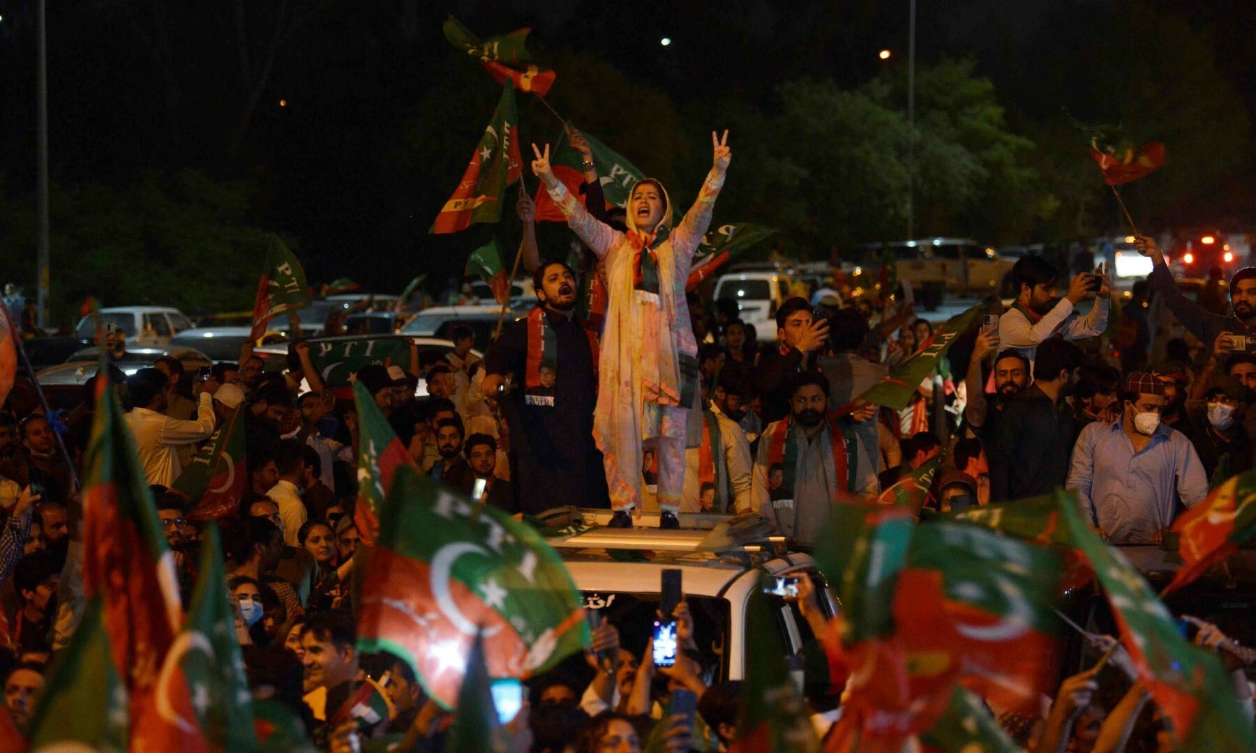 PTI supporters take part in a rally in support of former prime minister Imran Khan in Islamabad on April 10. — AFP