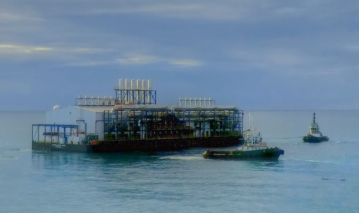 Estrella_del_Mar_II_powerbarge_with_tugboats_in_2012.jpg