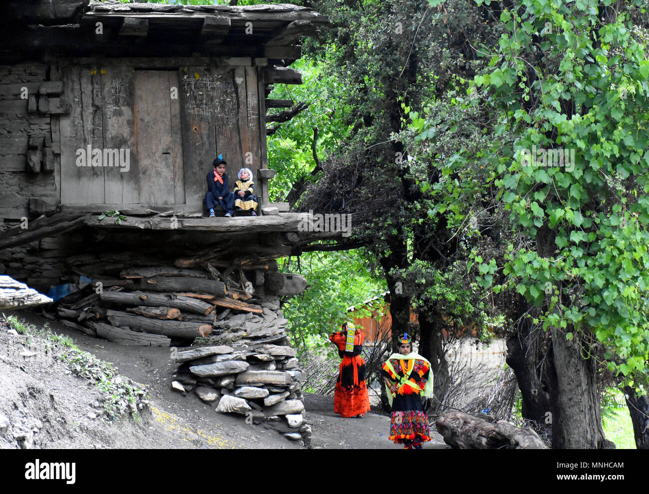 kalash-valley-pakistan-18th-may-2018-kalash-children-play-outside-their-home-in-kalash-valley-in-northwest-pakistans-chitral-district-on-may-14-2018-the-kalash-are-the-ancient-tribe-of-pakistan-and-they-have-their-own-way-of-life-religion-language-rituals-and-identity-credit-saeed-ahmad-sxkxinhuaalamy-live-news-MNHCAM.jpg