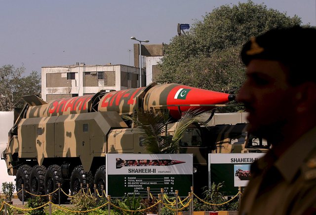 Pakistani%20soldier%20stands%20guard%20next%20to%20the%20Shaheen%20II%20missile%20during%20an%20International%20Defense%20Exhibition%20and%20Seminar%20IDEAS2006.jpg