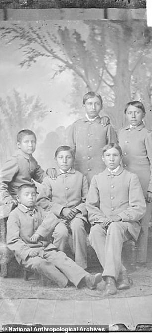 Many Native American students (pictured) were forced to cut their braids, dress in uniforms, speak English and adopt European names.