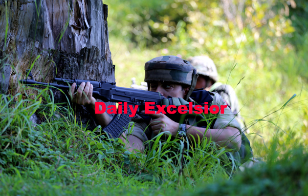 Police-officer-and-jawan-taking-position-during-encounter-at-Veji-top-area-of-Rafiabad-in-sopore-PHOTO-BY-AABID-NABI-1-copy.jpg