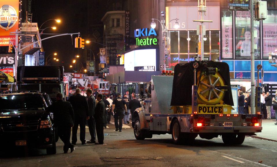 A police vehicle moves along 44th street near Times Square in New York Sunday, May 2, 2010, as an investigation was underway after an attempted car-bombing by Faisal Shahzad who received bomb-making training from the Tehreek e Taliban Pakistan.