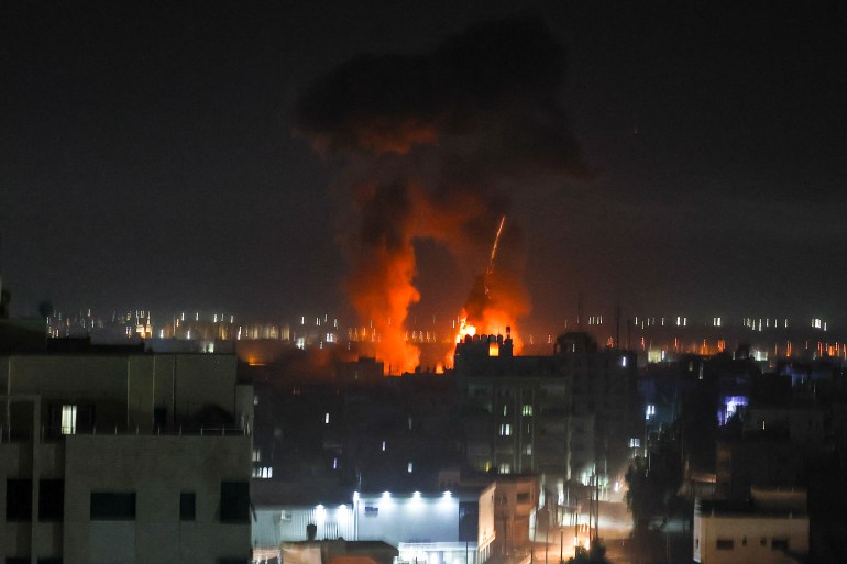 Explosions in Gaza City as Israeli forces attack the Palestinian enclave early on June 16 [Mahmud Hams/AFP]