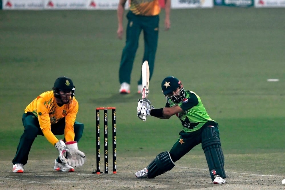 Mohammad Rizwan goes for a slog sweep, Pakistan vs South Africa, 2nd T20I, Lahore, February 13, 2021. — AFP