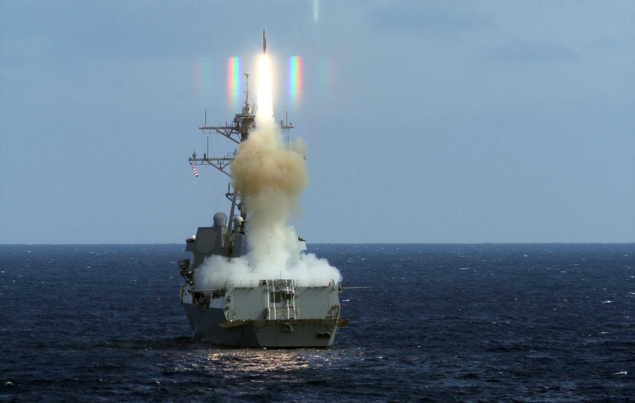 guided-missile+destroyer+USS+Roosevelt+(DDG+80)+launches+a+Standard+Missile+(SM)+2+Philippine+Sea,+and+USS+Truxtun+(DDG+103).JPG