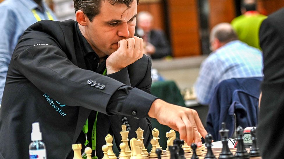 Magnus Carlsen competes in August 2022