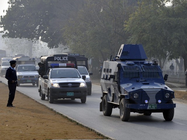 qadri-police-escort-afp-640x480.jpg