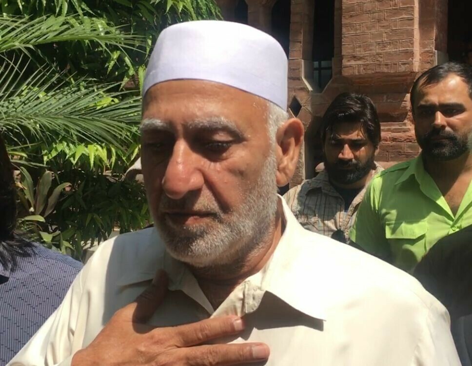   A photograph of Muhammad Riaz, father of anchorperson Imran Riaz’s father, taken outside the Lahore High Court on Friday. — Photo by author