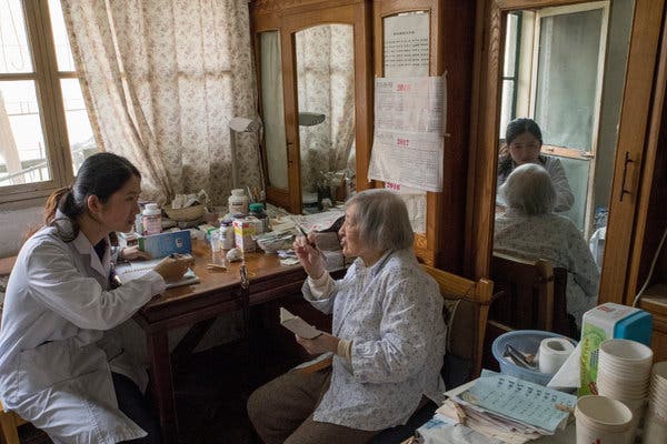 Dr. Zhu Min, who practices family medicine in Shanghai, splits her time between the local clinic, a hospital and patients’ homes.
