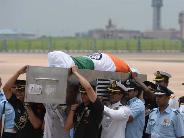 members-of-the-military-staff-carrying-the-coffin.jpg