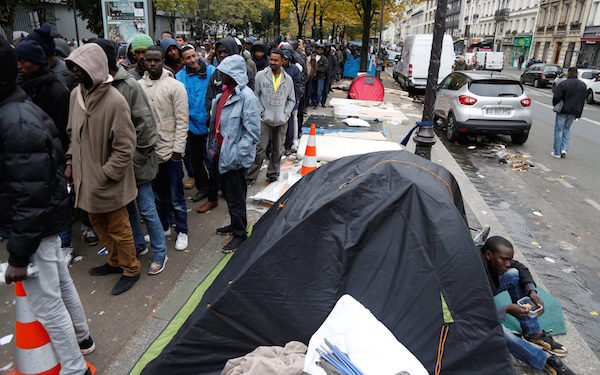 ParisAfricansLineUpFreeFoodNrStalingradMetro.jpg