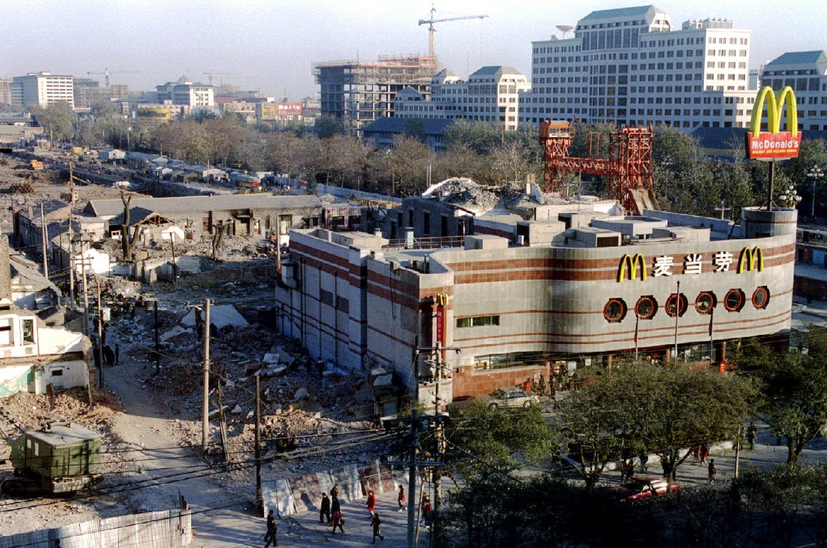 the-worlds-largest-mcdonalds-sat-in-central-beijing-looking-over-buildings-that-had-just-been-demolished-cranes-in-the-background-were-now-becoming-common-sights-in-big-cities.jpg