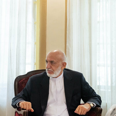 Hamid Karzai stays on in Afghanistan — hoping for the best, but unable to leave