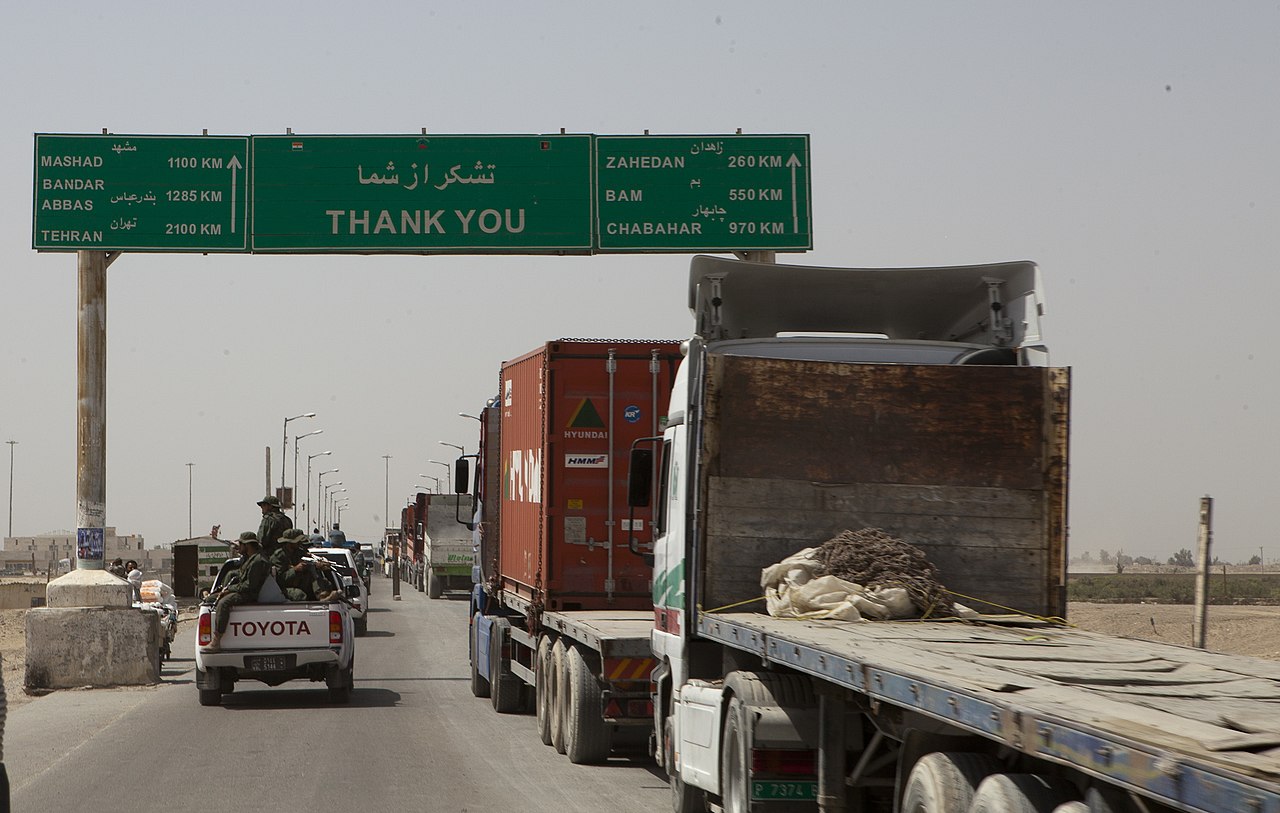 1280px-Afghanistan-Iran_border_in_Zaranj,_Afghanistan,_2011.jpg