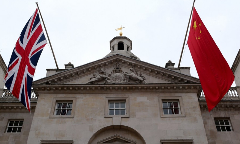 Chinese and British national flags are seen at the Horse Guards Parade in London, Britain, Oct. 17, 2015.File photo:Xinhua