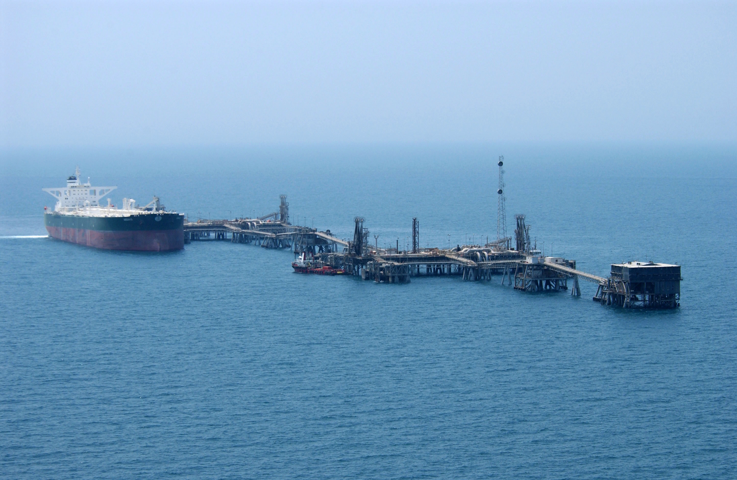 US_Navy_030629-N-4790M-006_Commercial_oil_tanker_AbQaiq_readies_itself_to_receive_oil_at_Mina-Al-Bkar_Oil_terminal_%28MABOT%29%2C_an_off_shore_Iraqi_oil_installation.jpg