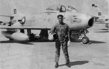 Flying Officer Waleed Ehsanul Karim poses in front of his F-86.