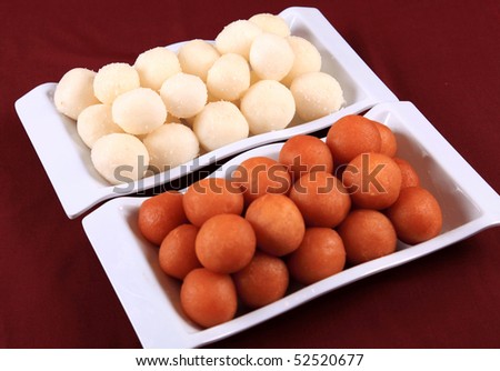 stock-photo-sweet-balls-called-gulab-jamun-and-rasgulla-indian-sweets-in-a-dish-52520677.jpg