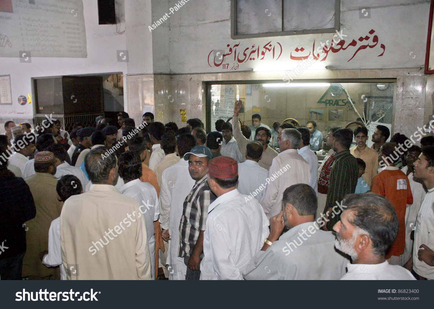 stock-photo-lahore-pakistan-oct-passengers-are-protesting-as-they-are-facing-problems-at-lahore-railway-86823400.jpg