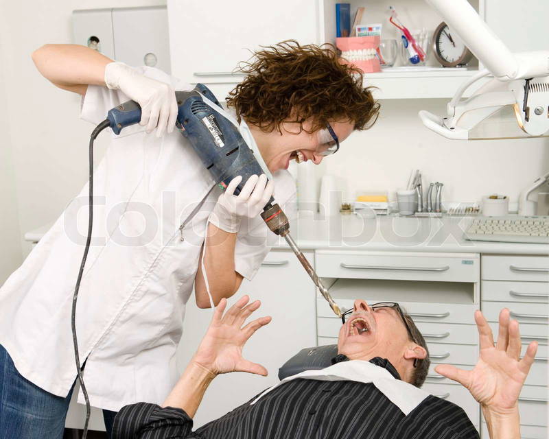 1028449-a-crazy-female-dentist-with-a-power-drill.jpg