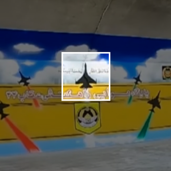 A poster visible in promotional videos for the base prominently features a silhouette resembling an Su-35.