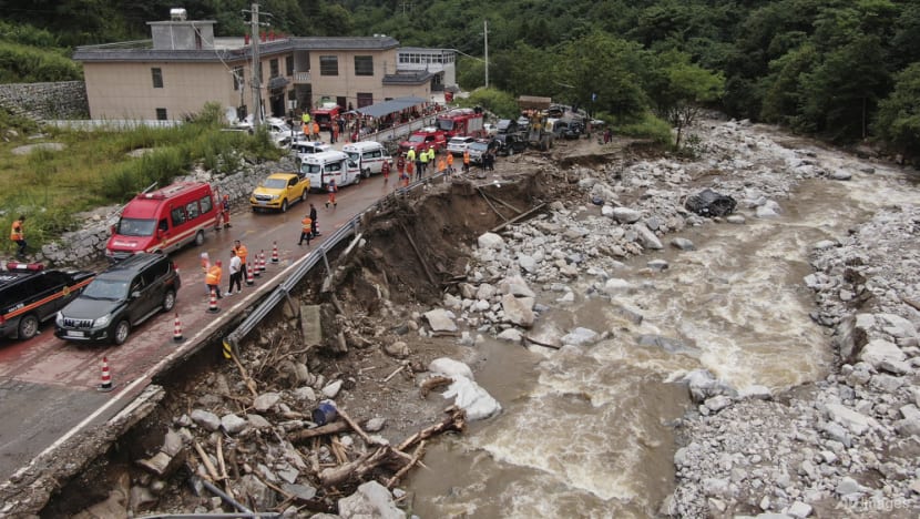 Death toll from mudslide in China's Xian rises to 21