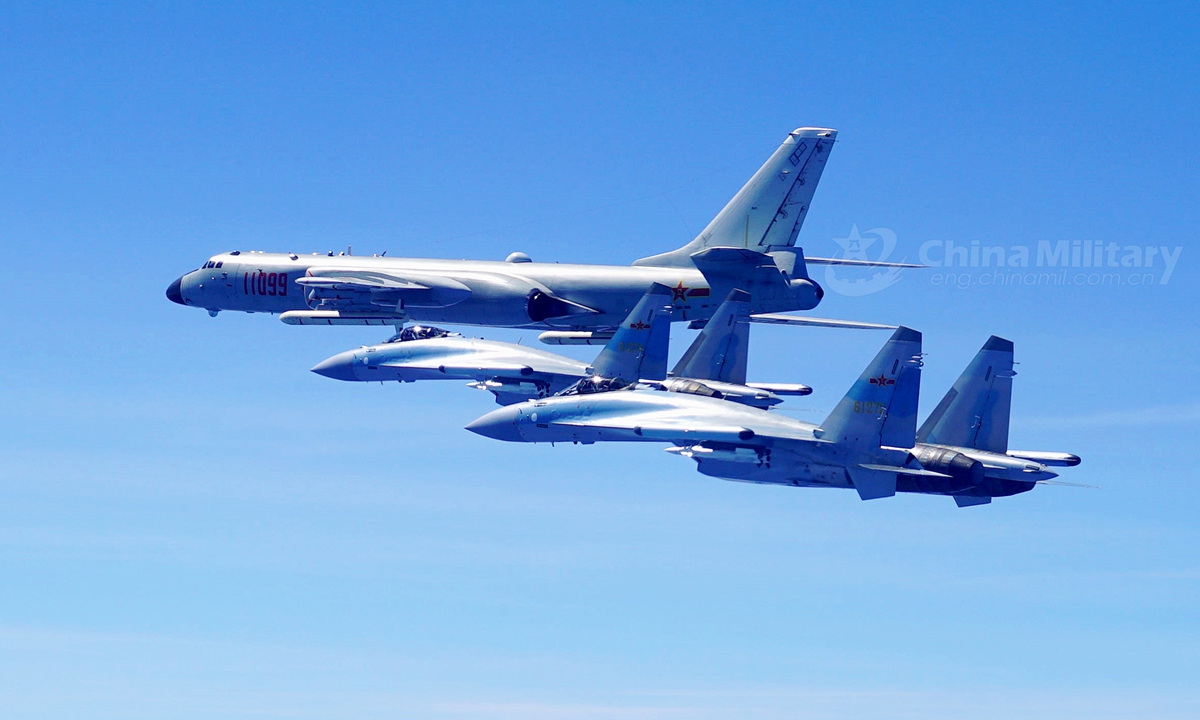 Two Su-35 fighter jets and a H-6K bomber fly in formation on May 11, 2018. The People's Liberation Army (PLA) air force conducted patrol training over China's island of Taiwan.File photo:China Military