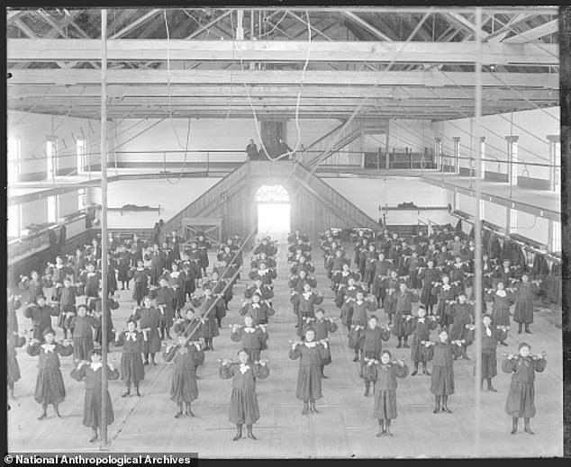 As many as 40,000 Native American children (pictured) may have died from poor care at government-run boarding schools around the US, McBride claims