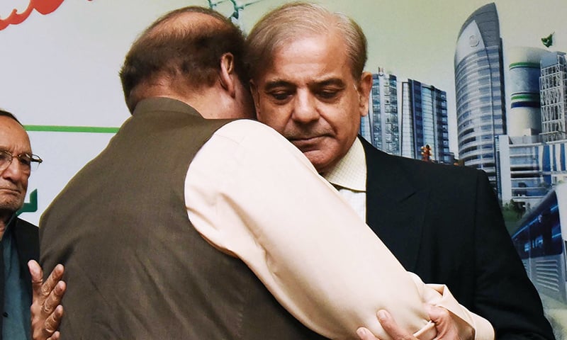 Shahbaz Sharif hugs his brother Nawaz Sharif, after being elected as head of PML-N. — File photo