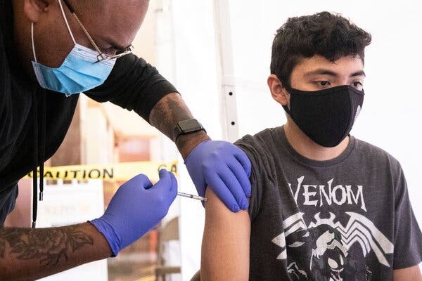 An 18-year-old student received a shot of a coronavirus vaccine in Los Angeles last month.