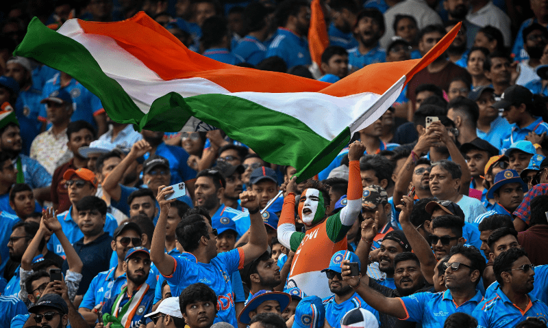 Fans cheer for team India during the 2023 ICC Men’s Cricket World Cup ODI match between India and Pakistan at the Narendra Modi Stadium in Ahmedabad on October 14, 2023. — AFP