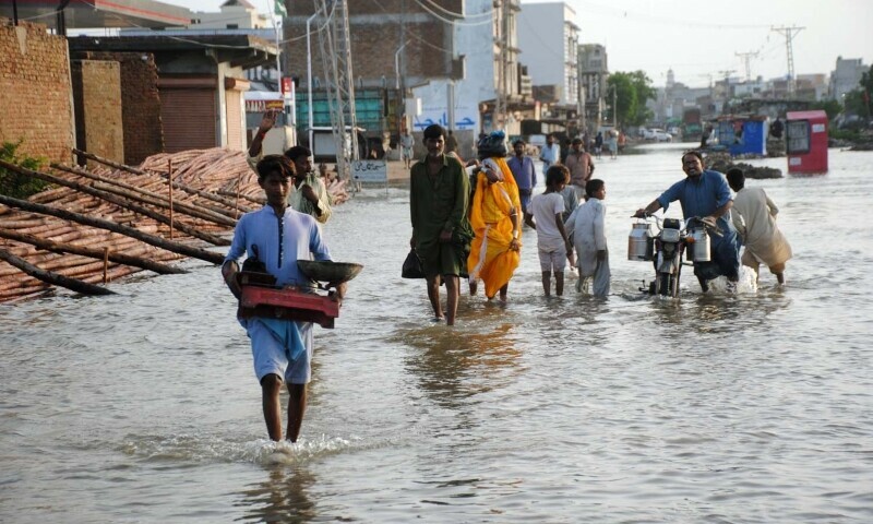 A view of a flooded road in Hyderabad division on Saturday. — Umair Ali