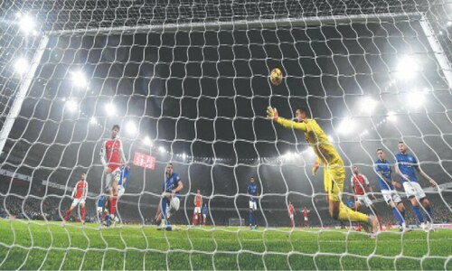 Arsenal climb to second with victory over Ipswich