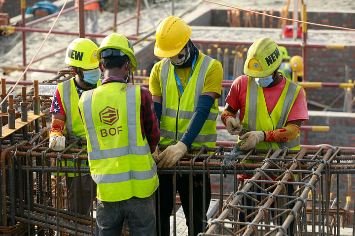 the workers are working on the third terminal building of hazrat shahjalal international airport.