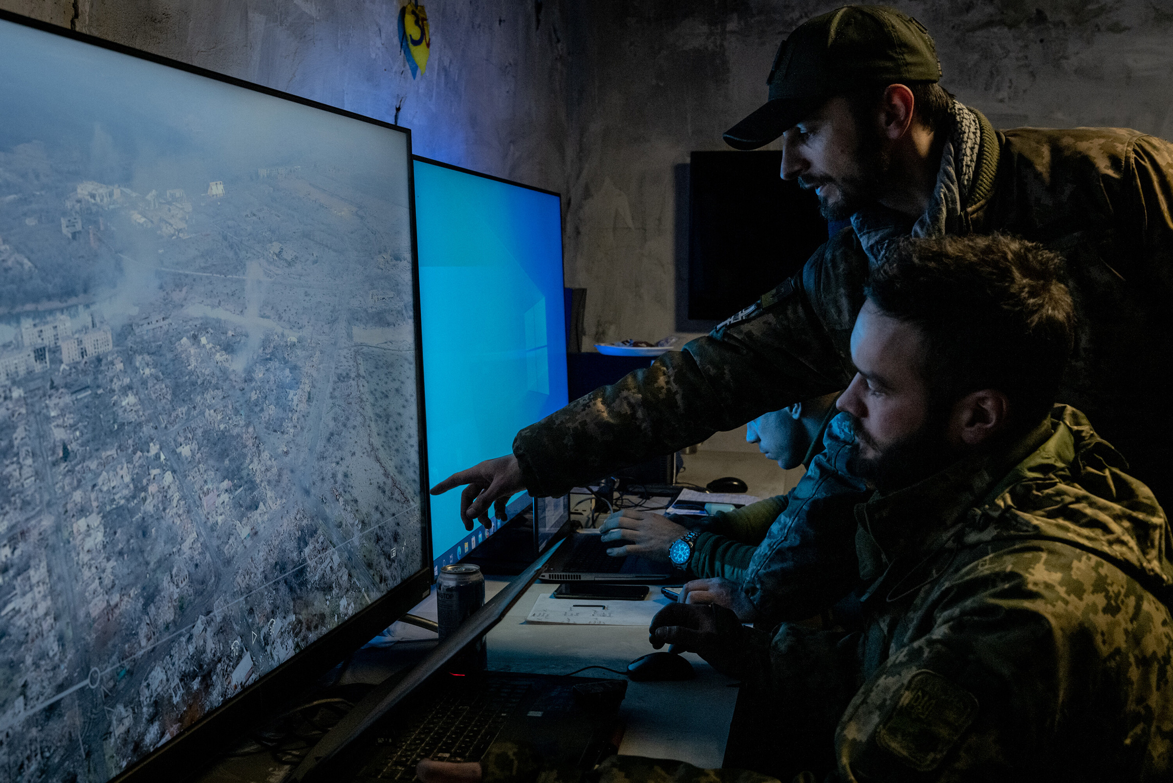 Ukrainian analysts review drone operators' footage near Bakhmut, Ukraine, on Jan. 6, 2023. (Nicole Tung—The New York Times/Redux)