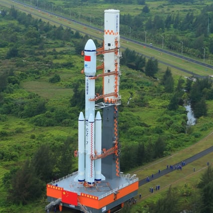 On Saturday, May 7, 2022, the combination of the Tianzhou 4 cargo spacecraft and a Long March 7 Y5 carrier rocket are shown being transferred in south China’s Hainan Province. Photo: Xinhua