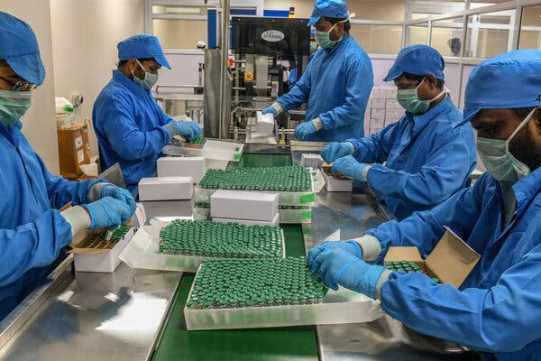 Serum Institute workers packing coronavirus vaccines in January. The company has fallen far short of its pledges to produce vaccines.