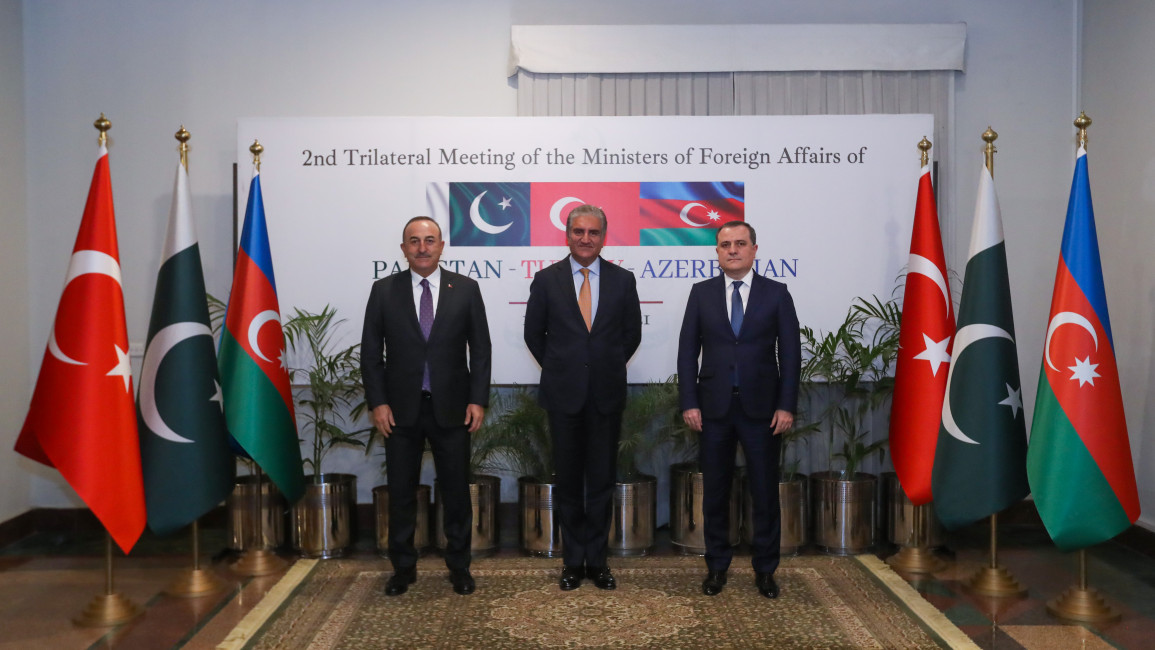 Minister of Foreign Affairs of Turkey, Mevlut Cavusoglu (L), Minister of Foreign Affairs of Pakistan, Shah Mahmood Qureshi (C) and Minister of Foreign Affairs of Azerbaijan, Jeyhun Bayramov (R) pose for a photo prior to the 2nd Trilateral Meeting of the Ministers of Foreign Affairs of Pakistan, Turkey, Azerbaijan in Islamabad, Pakistan on January 13, 2021