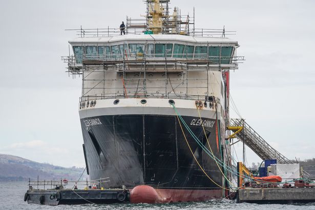 A worker is seen on top of the Glen Sannox Caledonian Macbrayne ferry in the Ferguson Marine shipyard on April 1, 2022 in Port Glasgow