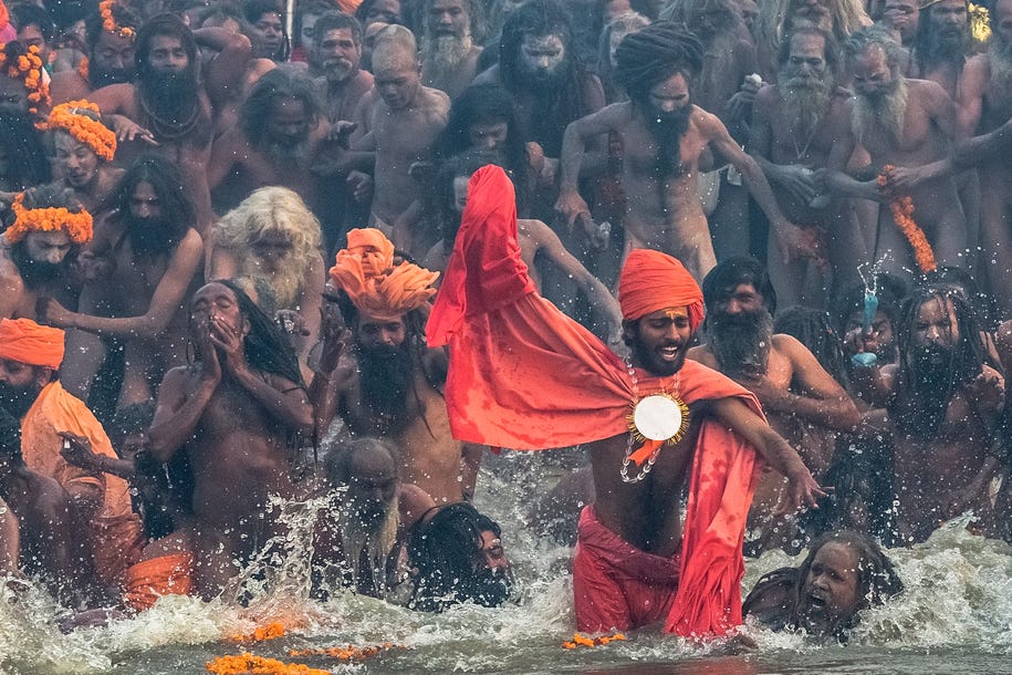 hindus-bathe-in-the-confluence-of-three-rivers-to-wash-away-their-sins.jpg