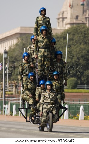 stock-photo-motorbike-display-team-of-the-indian-army-riding-down-the-raj-path-in-preparation-for-the-republic-8789647.jpg